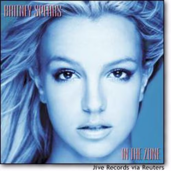 Singer Britney Spears is pictured on the cover of her first album in two years, titled "In The Zone." The first single from the album, titled "Me Against the Music," is being boosted by a steamy music video featuring Spears and singer Madonna.