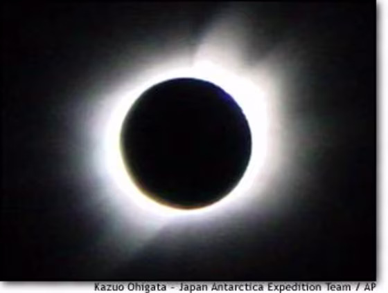 The moon blots out the sun over Antarctica early Monday in a photo released by a Japanese expedition team via the Kyodo news service.