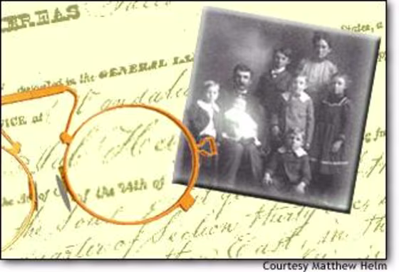 Matt Helm's grandmother sits in the lap of his great-grandfather. In the background is the land patent granting him land in Illinois in 1840.