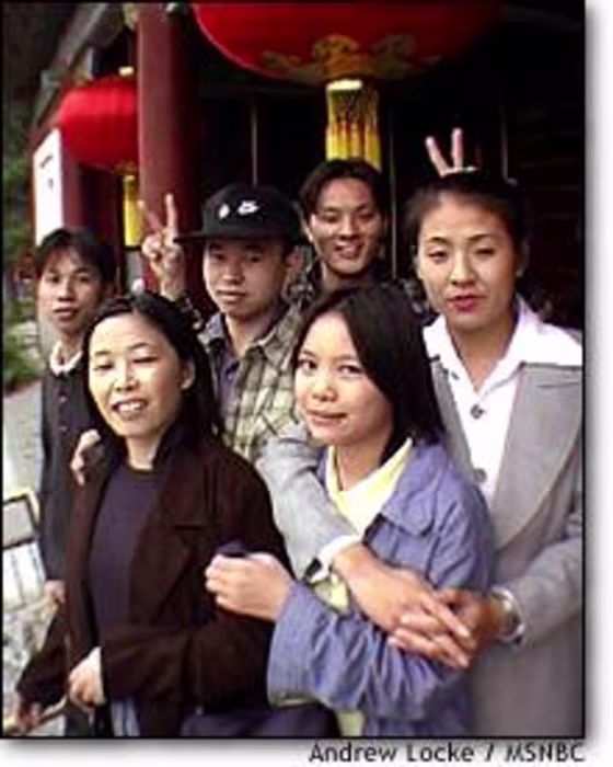 A group of friends from Guangdong province pose during a visit to the Summer Palace in Beijing.