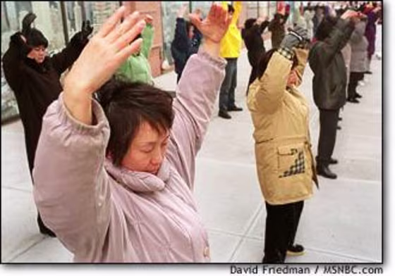 Nancy Lin and around 60 of her fellow Falun Gong practitioners go through their exercises outside the Chinese consulate in New York last week.