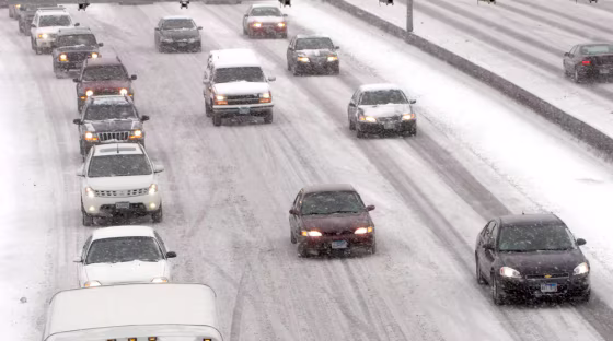 Image: Traffic on Interstate 94 was slow going as a major snow storm hits in Minneapolis, Minnesota