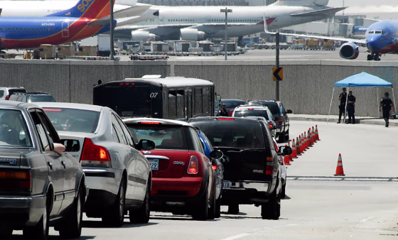 Image: Traffic backs up at a vehicle checkpoint at Los Angeles International Airport