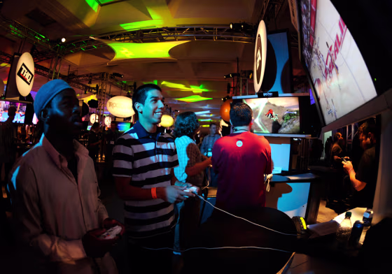 Devin Landin and Julius Buckner play EA Sports' NBA Live 09 at the E3 Media & Business Summit in Los Angeles
