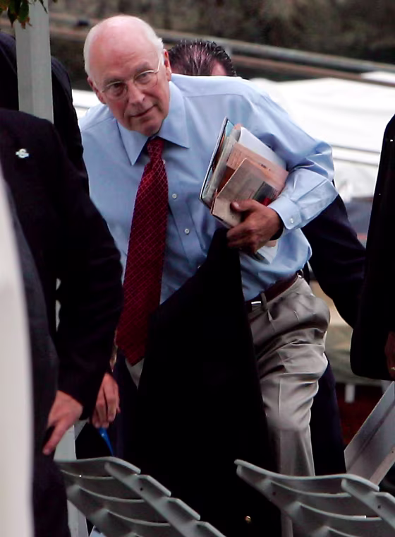 Image: US vice president Dick Cheney arrives, after he spent in a tour on the Como lake a break, at a meeting of political and business leaders in Cernobbio, by the Como lake