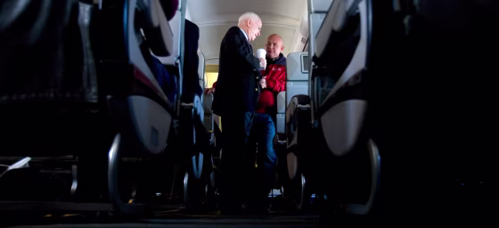 Sen. John McCain (R-Ariz.) and adviser Steve Schmidt on board McCain's campaign jet en route to Chicago on Feb. 1, 2008.