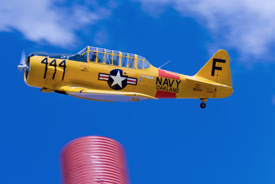 A Harvard MK IV piloted by Jim Booth rounds a pylon during the Reno National Championship Air Races on Friday. 