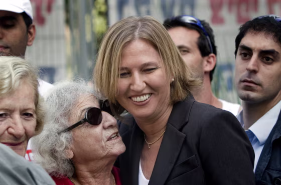 Tzipi Livni, Israeli foreign minister, greets supporters outside the voting station in Tel Aviv during the Kadima elections Wednesday.