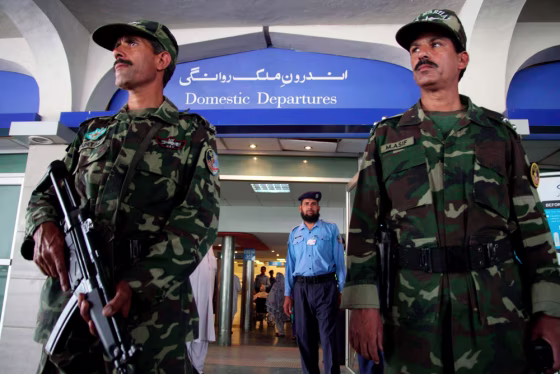 Image: Police stand guard