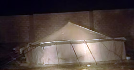 Image: A tent at a civilian building construction site is seen in this image from television