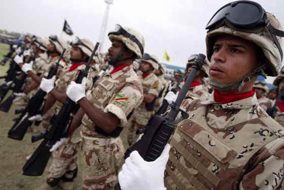 Image: Iraqi Armed Forces parade in a football stadium