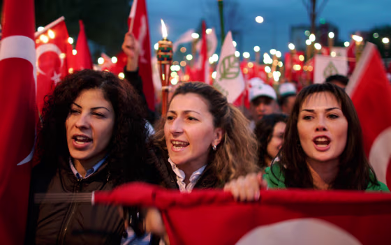 Image: Protesters shout slogans against outlawed PKK as they march around mausoleum of Ataturk in Ankara