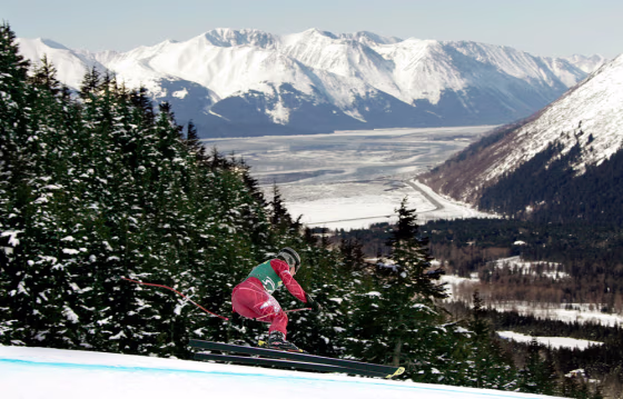 Image: A skier races down the hill at Alyeska Resort in Girdwood, Alaska