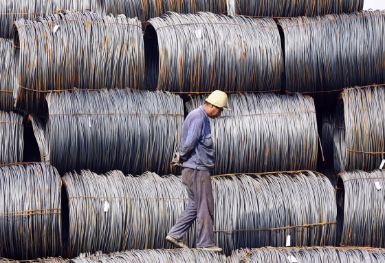 Image: pile of steel at an iron and steel mill yard in Hefei, China