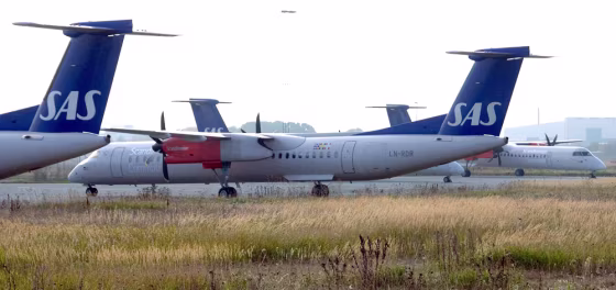 Image: Four Scandinavian Airlines Bombardier Q400 turboprop aircrafts