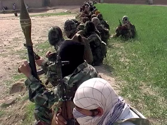 These Taliban militants were among the hundreds who staged a public display Sunday in Inayat Kili, a Pakistani town along the border with Afghanistan. A militant leader addressing the crowd said he welcomed talks with Pakistan's new government.