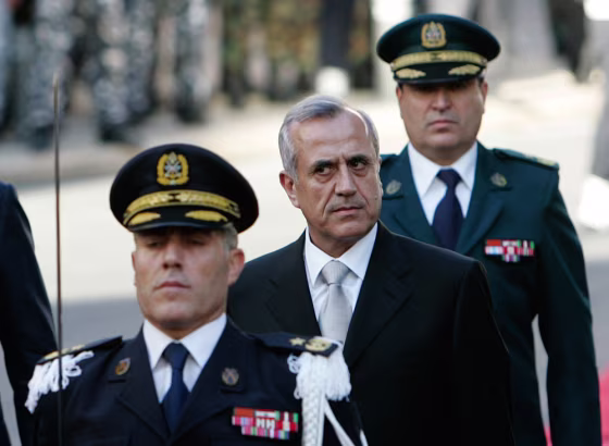 Image: Newly-elected Lebanese President Michel Suleiman, center, reviews the honor guard upon his arrival at the Lebanese Parliament, in Beirut, Lebanon