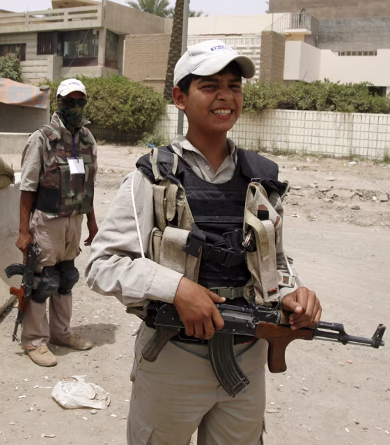 Image: Members of U.S.-backed Neighbourhood Patrol