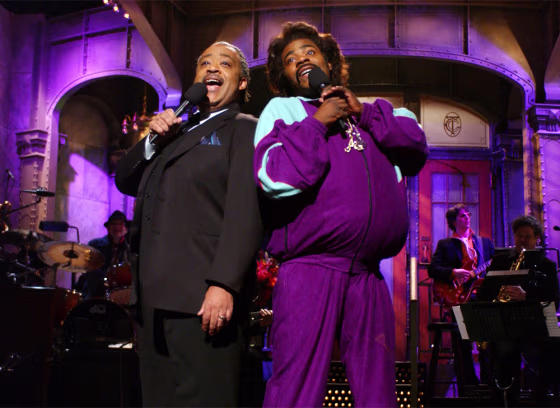 Al Sharpton, left, honed his joke-telling skill by guest-hosting "Saturday Night Live." Here, he joins Tracy Morgan in a skit on the show.