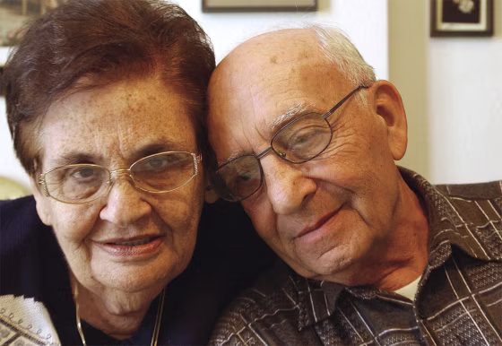 Shoshana November, 73, left, and her brother Binyamin Shilon, 78, right, pose for a photo Monday.