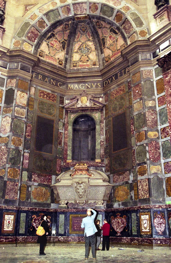 Tourists look at the sarcophagus of Grand Duke Francesco I (1541-1587), displayed inside the Medici Chapel in Florence.&nbsp;Starting in July, scientists will exhume 49 bodies buried in the Medici Chapel and conduct a series of tests.