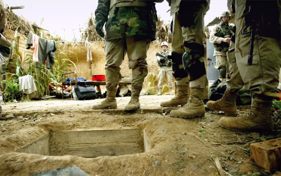 Soldiers Guard Compound Where Saddam Hussein Was Captured