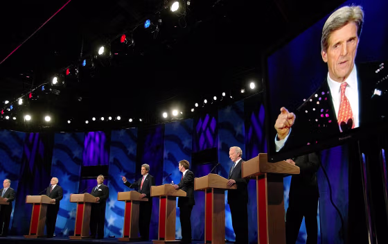 Kerry, who needed to enhance the illusion that he already is the nominee, gets some help from a giant television monitor during Thursday's debate.