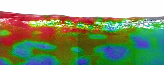 Scientists say this false-color image, created by the Opportunity rover's&nbsp;mini-thermal emission spectrometer,&nbsp;is the first mineral map made on another planet. The red color indicates areas high in the mineral hematite. The blue spots, which correspond to places where the spacecraft bounced and rolled,&nbsp;have low concentrations of hematite. "Somehow it's made the hematite disappear," principal science investigator Steve Squyres said.