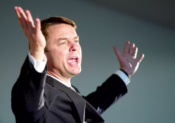 US DEMOCRATIC PRESIDENTIAL CANDIDATE EDWARDS  GESTURES DURING CAMPAIGN SPEECH