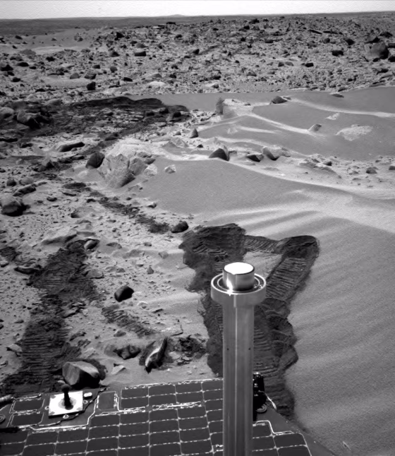 The Spirit rover's navigation camera looks back at&nbsp;the vehicle's&nbsp;trail alongside a drift of material known as "Serpent." Spirit spun its wheels in the drift to expose the fine-grained dust beneath the surface.