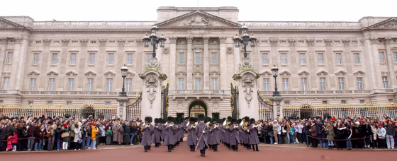 THE CHANGING OF THE GUARD AT BUCKINGHAM PALACE WHERE SPAIN'S NATIONAL ANTHEM WAS PLAYED IN MEMORY OF THE VICTIMS OF MADRID BOMBINGS