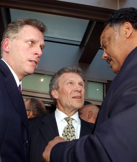 DNC CHAIRMAN MCAULIFFE GREETS SENATE MINORITY LEADER DASCHLE AND JACKSON AT OPENING OF NEW DEMOCRATIC HEADQUARTERS IN WASHINGTON