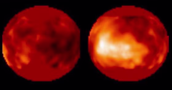 Light and dark surface features show up in infrared images of Titan, captured by the Hubble Space Telescope. Do those features represent continents and oceans of liquid ethane and methane? Scientists say it's too early to tell.