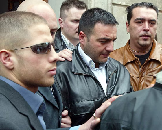 BROTHER OF ITALIAN HOSTAGE QUATTROCCHI ARRIVES AT HIS HOME IN GENOA