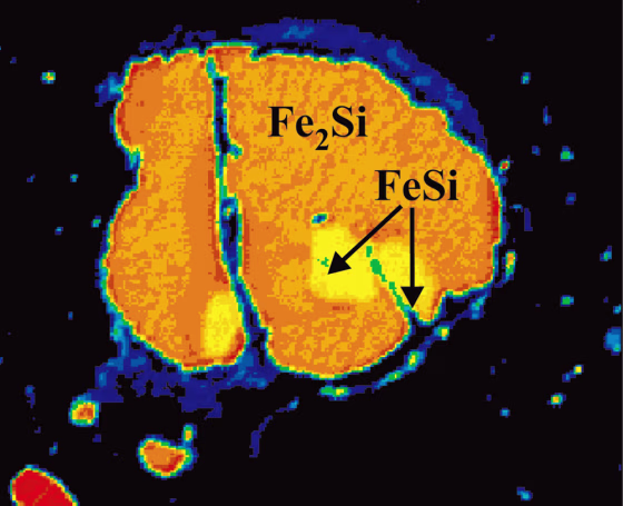 A backscatter electron image shows the newly discovered mineral, known as hapkeite or Fe2Si, in orange. Another type of mineral, FeSi, is indicated&nbsp;as&nbsp;yellow.