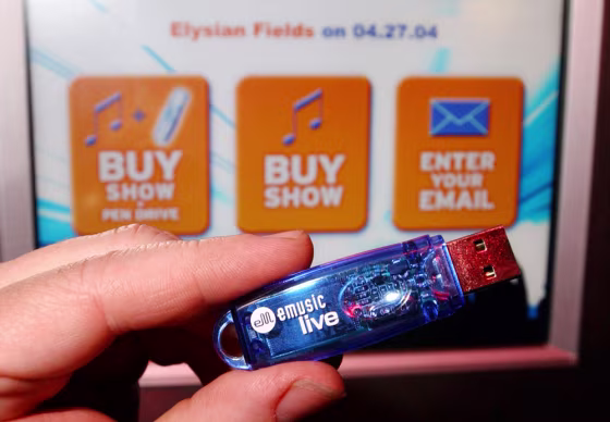 An eMusicLive USB pen drive and live music kiosk are shown in New York on&nbsp;April 27. Users can now&nbsp;load a live recording of a show onto a cigarette-lighter-sized hard-drive that can hang off a keychain.