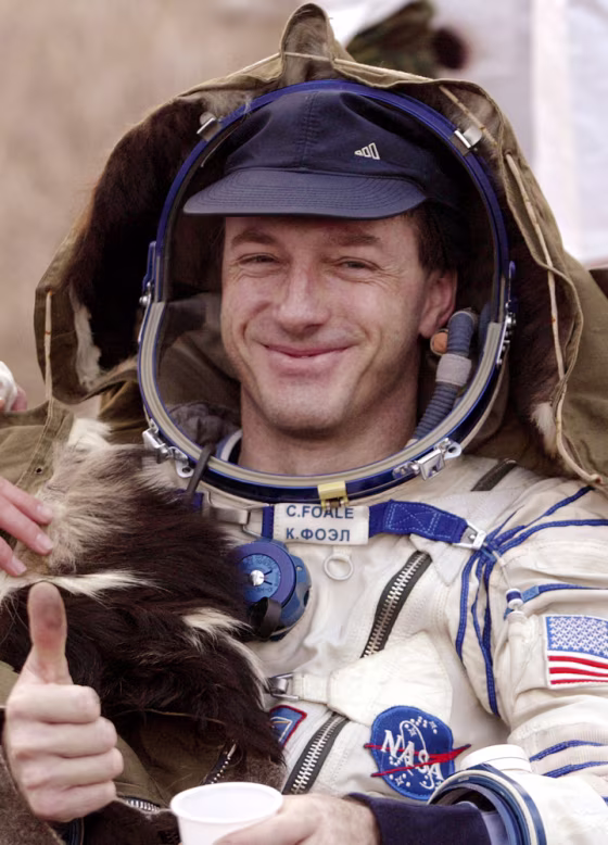 NASA astronaut Michael Foale gives a thumbs-up sign shortly after Friday's landing in a Russian Soyuz spacecraft near the town of Arkalyk in north-central Kazakhstan.