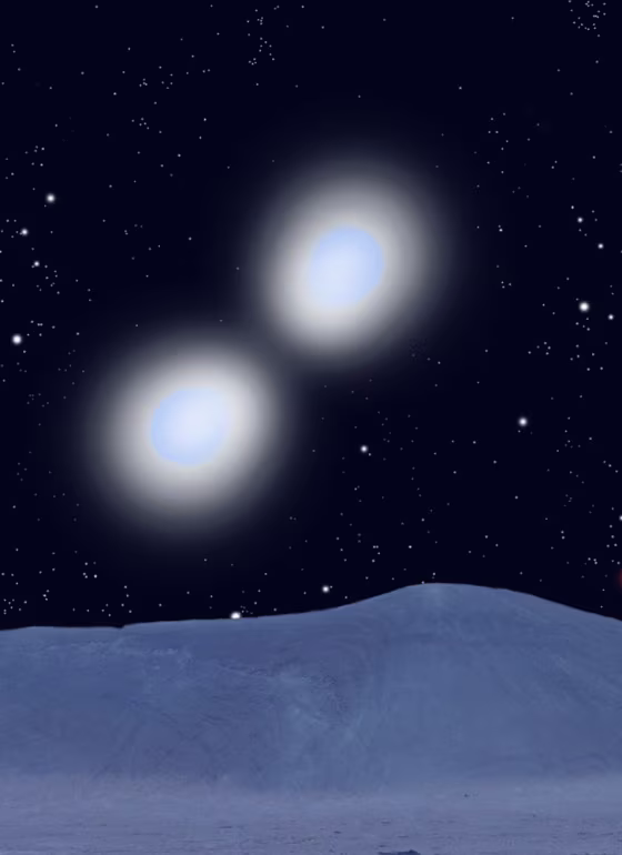 The new heavyweight champion stars, shown in this artist's conception, reside in the binary system WR 20a. They orbit each other every 3.7 days, so close that the gravity of each star distorts the other's shape.