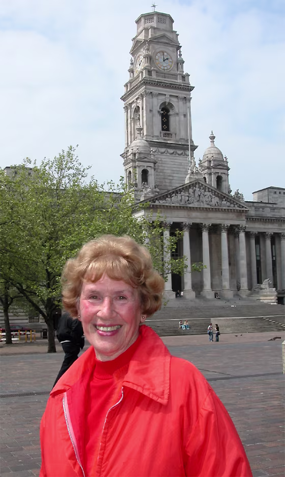 Moreen James, a World War II veteran of the Women’s Royal Naval Service, is seen in front of the Guildhall in Portsmouth, which retains its 19th century&nbsp;exterior despite having been gutted&nbsp;in a 1945 German attack on the naval city.