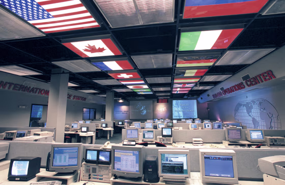 The flags of the nations involved in the international space station light up workstations in NASA's high-tech Payload Operations Center, at Marshall Space Flight Center in Huntsville, Ala.
