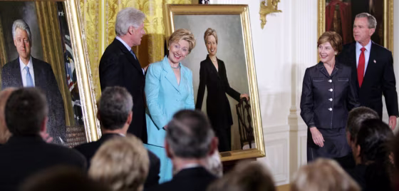 FORMER PRESIDENT CLINTON POSES WITH PORTRAIT TO HANG IN WHITE HOUSE