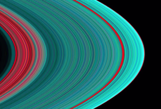 A color-enhanced ultraviolet image captured by Cassini shows Saturn's A ring. The A ring begins with a "dirty" interior of red, followed by a general pattern of more turquoise as it spreads away from the planet. The blue colors indicate denser material made up of ice. The red band three-fourths of the way outward is known as the Encke Gap. 