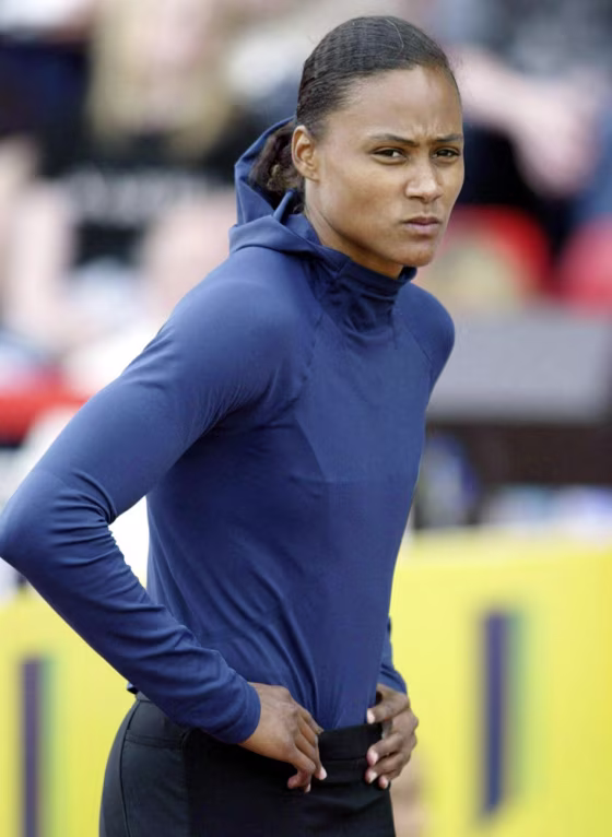 As&nbsp;five-time Olympic gold medalist Marion Jones prepared for Friday's early rounds of the 100 meters at the eight-day U.S. Olympic track and field trials, she is dogged by far weightier questions than how many medals she will win in this year's Games.