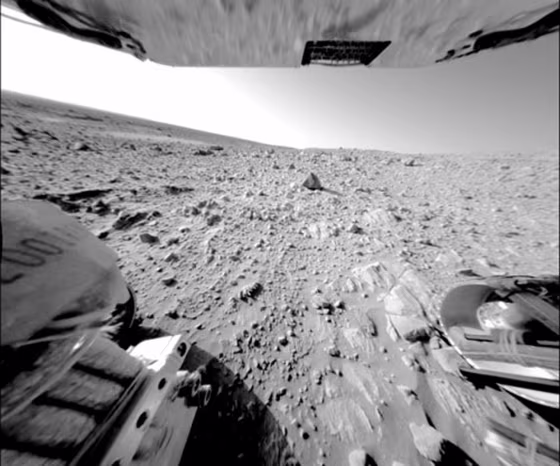 A large, continuous rock outcrop at the base of the "Columbia Hills" is seen in this image taken by Spirit's rear hazard-avoidance camera.