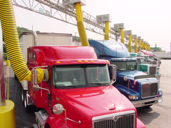 Trucks at the Petro Travel Center in Knoxville, Tenn., get their power and air/heat from yellow ducts that connect to windows.