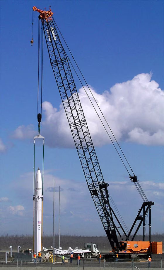 Workers lower a ground-based missile interceptor into its silo Thursday at Fort Greely near Delta Junction, Alaska, on Thursday July 22, 2004. The interceptor is the first component of a national defense system designed to shoot down enemy missiles.
