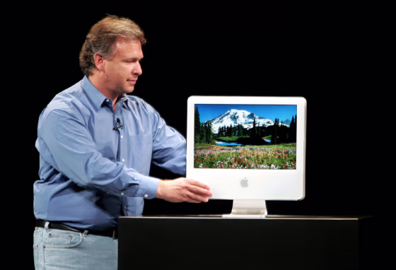 Apple senior Vice-President of worldwide product marketing Philip Schiller presents the new iMac computer in Paris