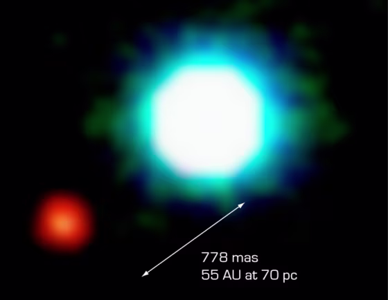 This image shows the brown dwarf 2M1207 as a bright white object, and the presumed planet as a reddish object. The line indicates an angular distance of 778 milliarcseconds, which translates to 55 times the distance between Earth and the sun.