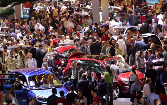Thousands of visitors look at cars on display at the Paris Mondial de l Automobile
