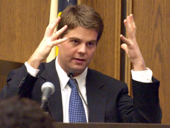 Alexander Pring-Wilson gestures&nbsp;during testimony Tuesday as he describes the street fight that resulted in the death of 18-year-old Michael Colono.